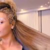 Beyonce shows off her natural hair while using Cécred products