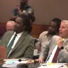 Young Thug Trying and  attorney share a  laugh during trail break..