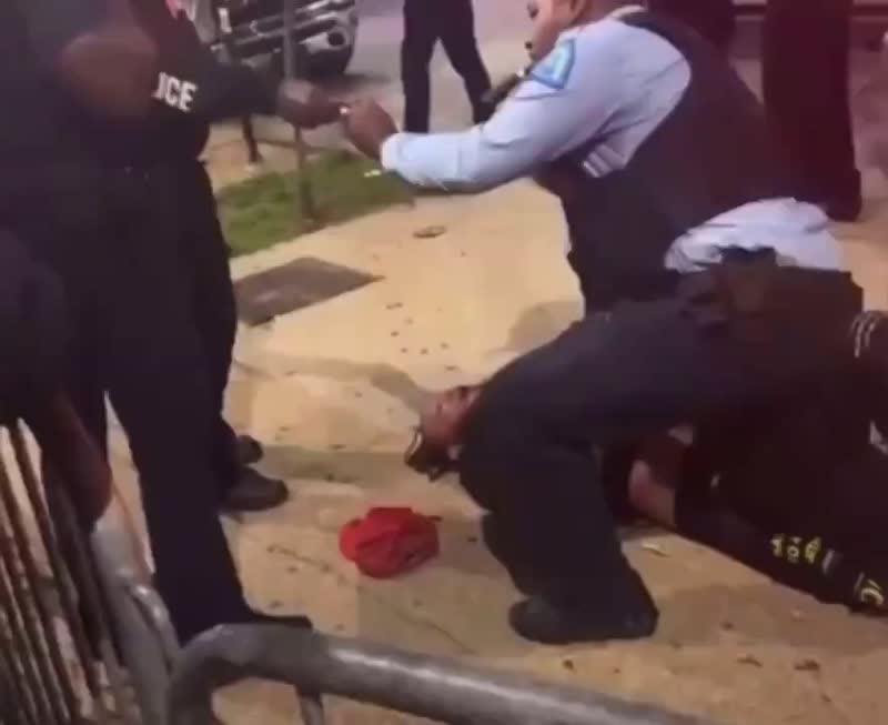 Investigation launched after a St. Louis, Missouri police officer was seen lighting up a cigar while arresting a suspect