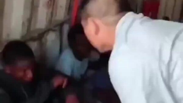 WATCH: Chinese employer in Africa treating his employees like Trans Atlantic slaves