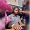 Teacher fired after sharing video of students styling his hair