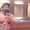 A shirtless Stevie J flexes in a public men's restroom while reacting to Diddy's son, King Combs, 50 cent diss song "Pick a Side."