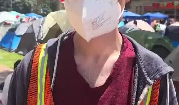 white pro-Palestine domestic terrorists harassing a black student and his daughter at UCLA encampment.