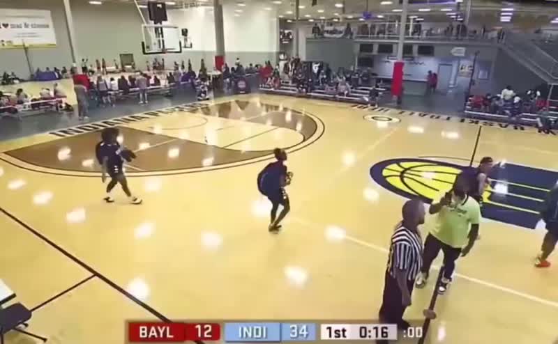 Ref gets suplexed after making a bad call