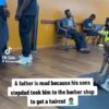 father (black shirt) was pissed because his son’s stepdad (blue shirt) took him to the barbershop to get a haircut