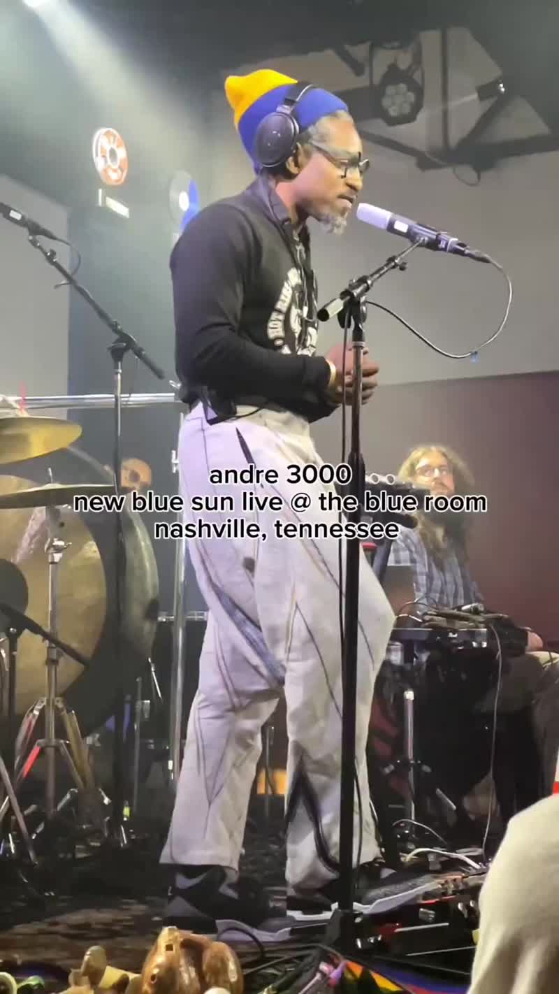 André 3000 explains to an audience what made him start playing the flute