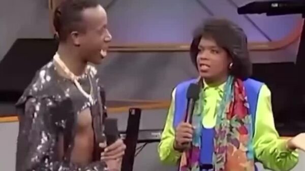 Throwback: MC Hammer explains "Hammer Time" and shows Oprah how to do the dance (1990)