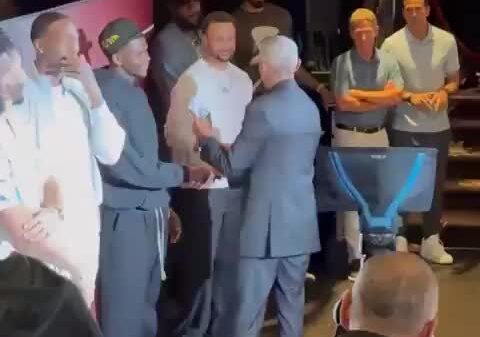 Former President Barack Obama dapping up Team USA basketball players