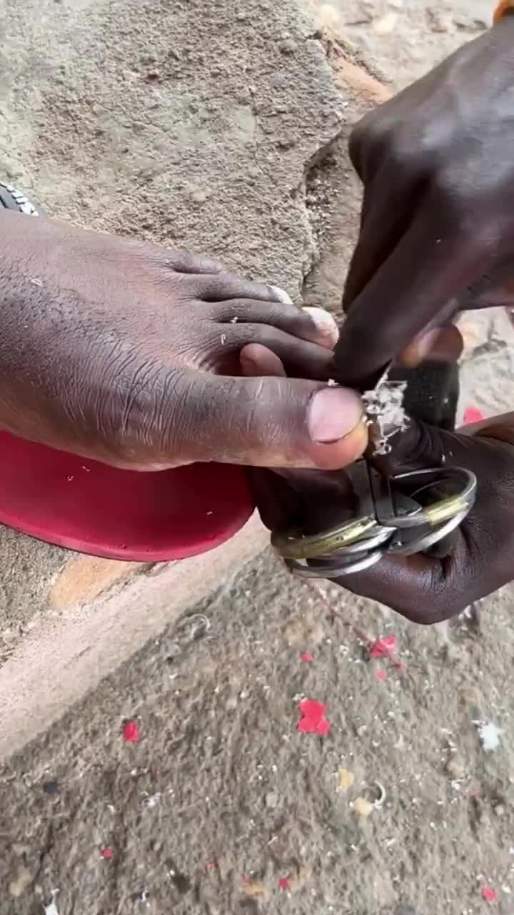 NIGERIA, Africa: You can get a "20 cent" pedicure on the side of the road in any shantytown or village