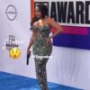 Angela Simmons with the gun purse at the BETAwards