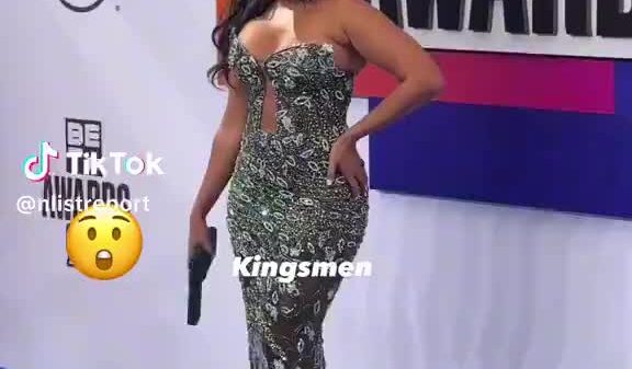 Angela Simmons with the gun purse at the BETAwards