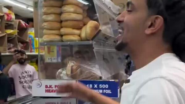 Big Sean got a chopped cheese on coco bread the ocky way in NYC