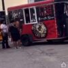 Women request refund and food truck denied it and customer enters food truck to fight her