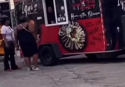 Women request refund and food truck denied it and customer enters food truck to fight her