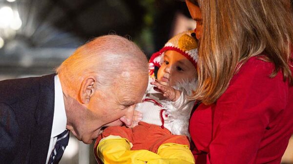 President Joe Biden Bites Several Babies at Halloween Party