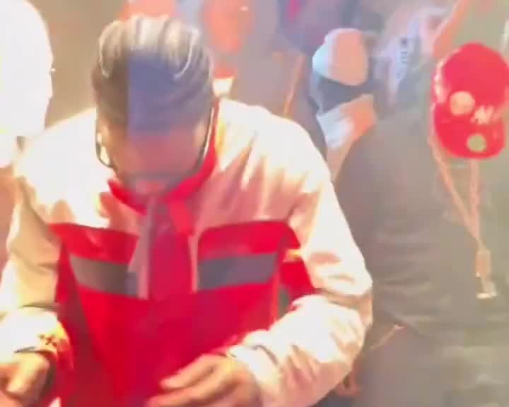 Travis Scott smashing a laptop in Paris