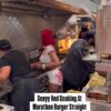 Sexyy Red cooking at Marathon Burger after performing at Rolling Loud
