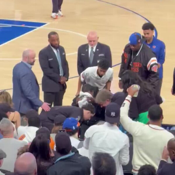Tracy Morgan getting wheeled out from courtside at MSG