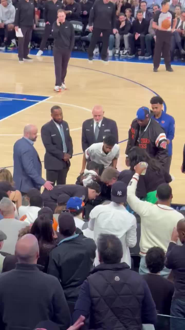 Tracy Morgan getting wheeled out from courtside at MSG